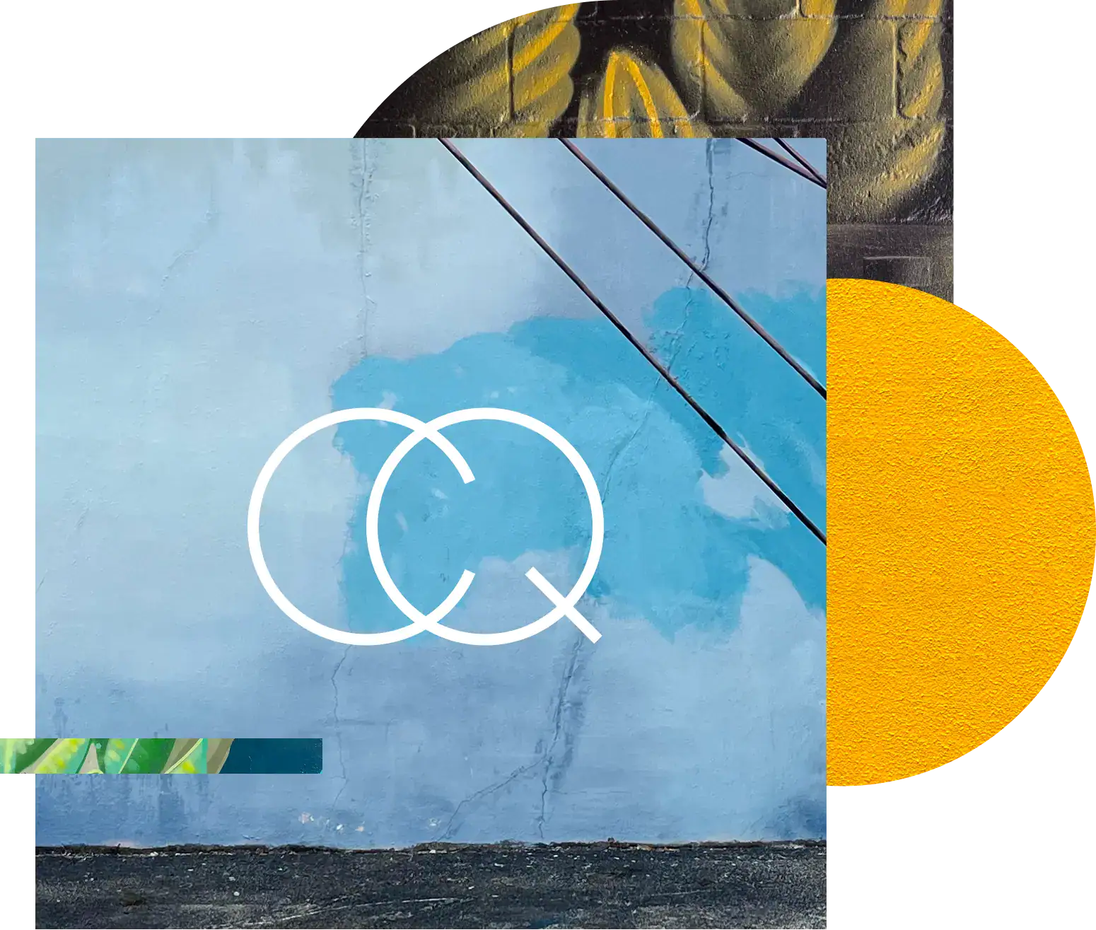 Blue wall with logo and wires, urban street art scene.