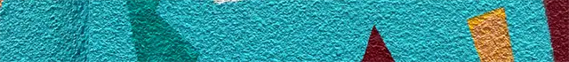 Vibrant abstract geometric pattern with textured surface in multiple colors.