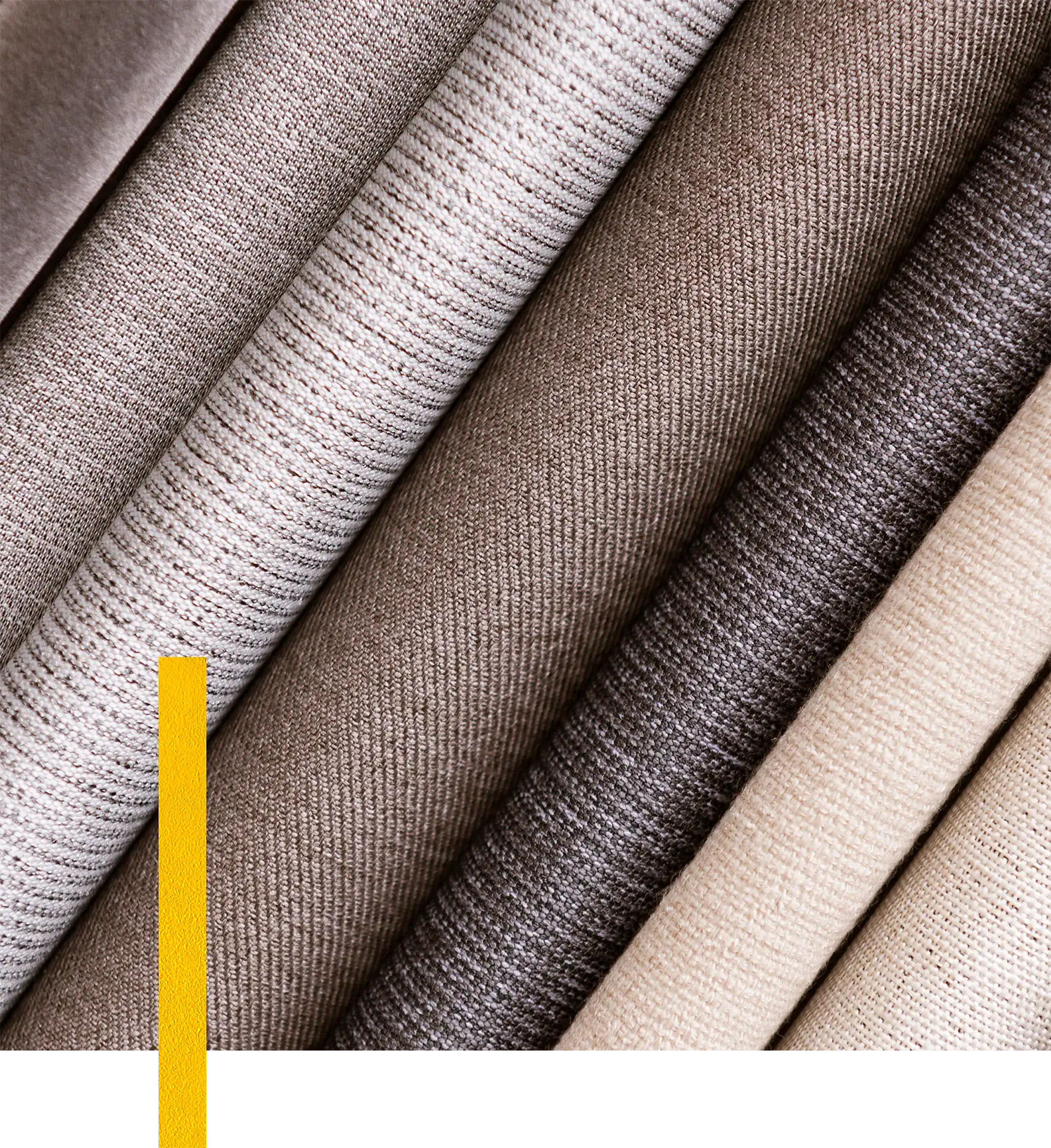 Soft, textured fabrics in beige, taupe, and brown shades for home decor.