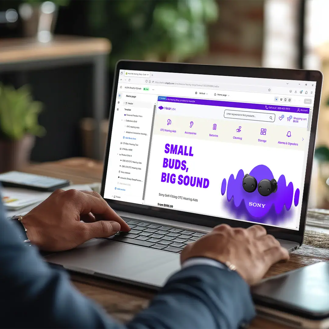 Hearing Aid Network Shopify Market Place Laptop View with someone working the laptop