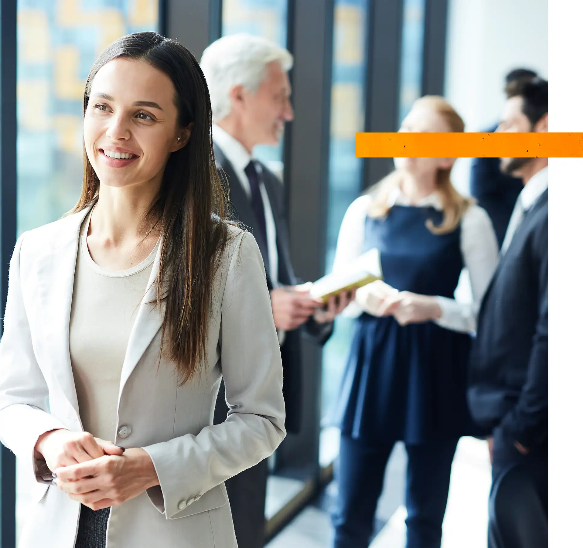 Businesswoman smiling at a professional networking event or conference.