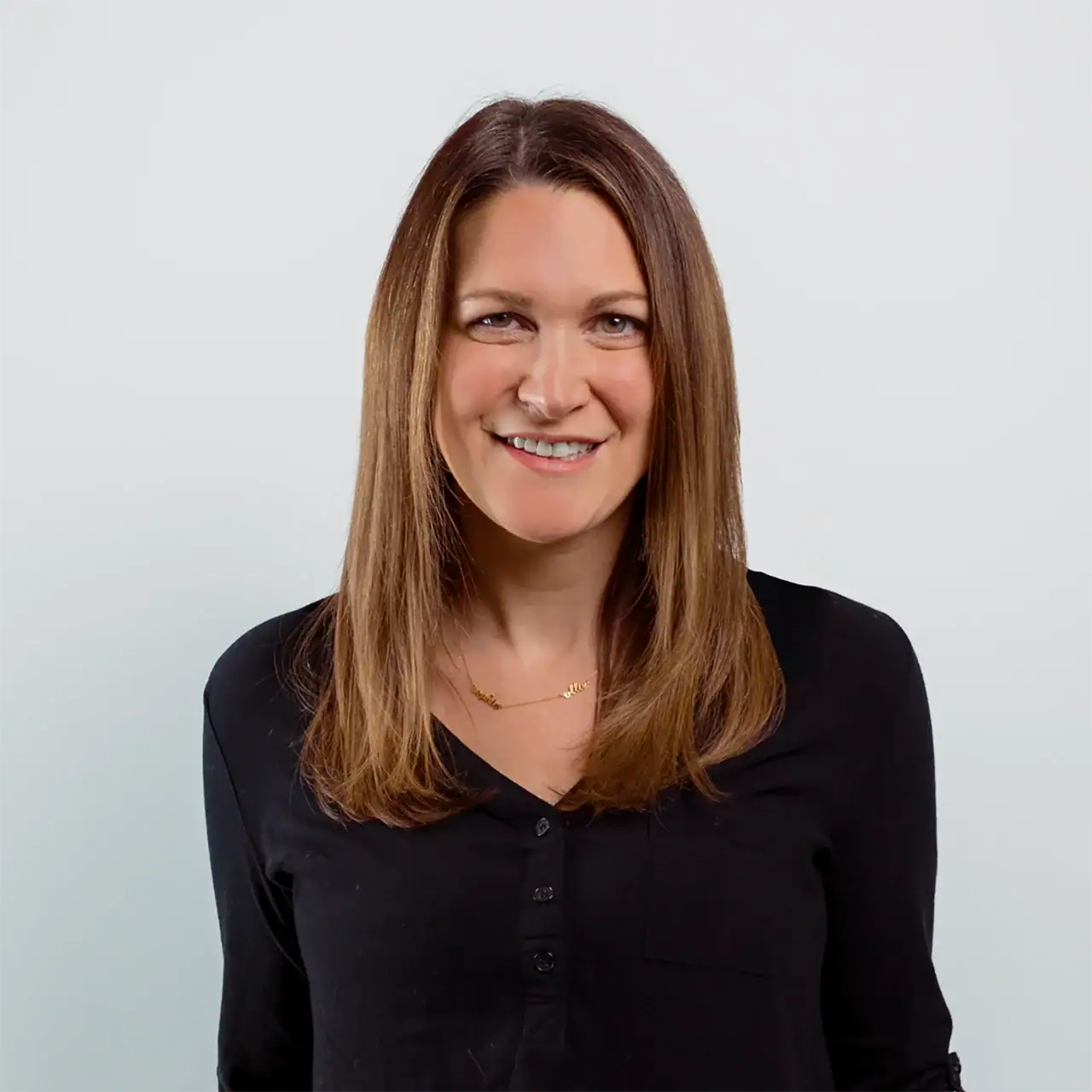 Headshot of Elana Kerr, Director of Media