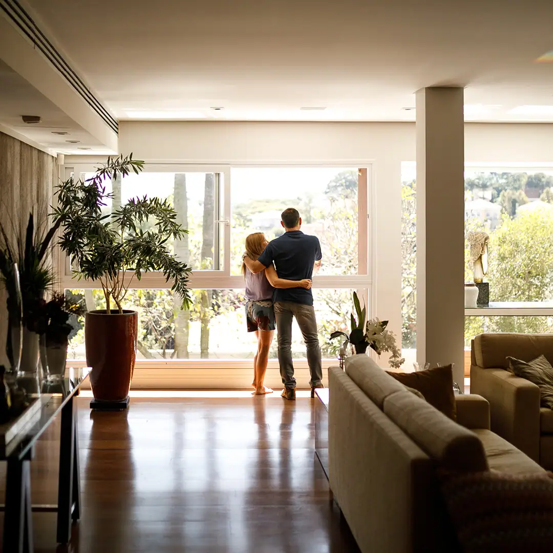 All American Shutters & Glass Couple Lounging