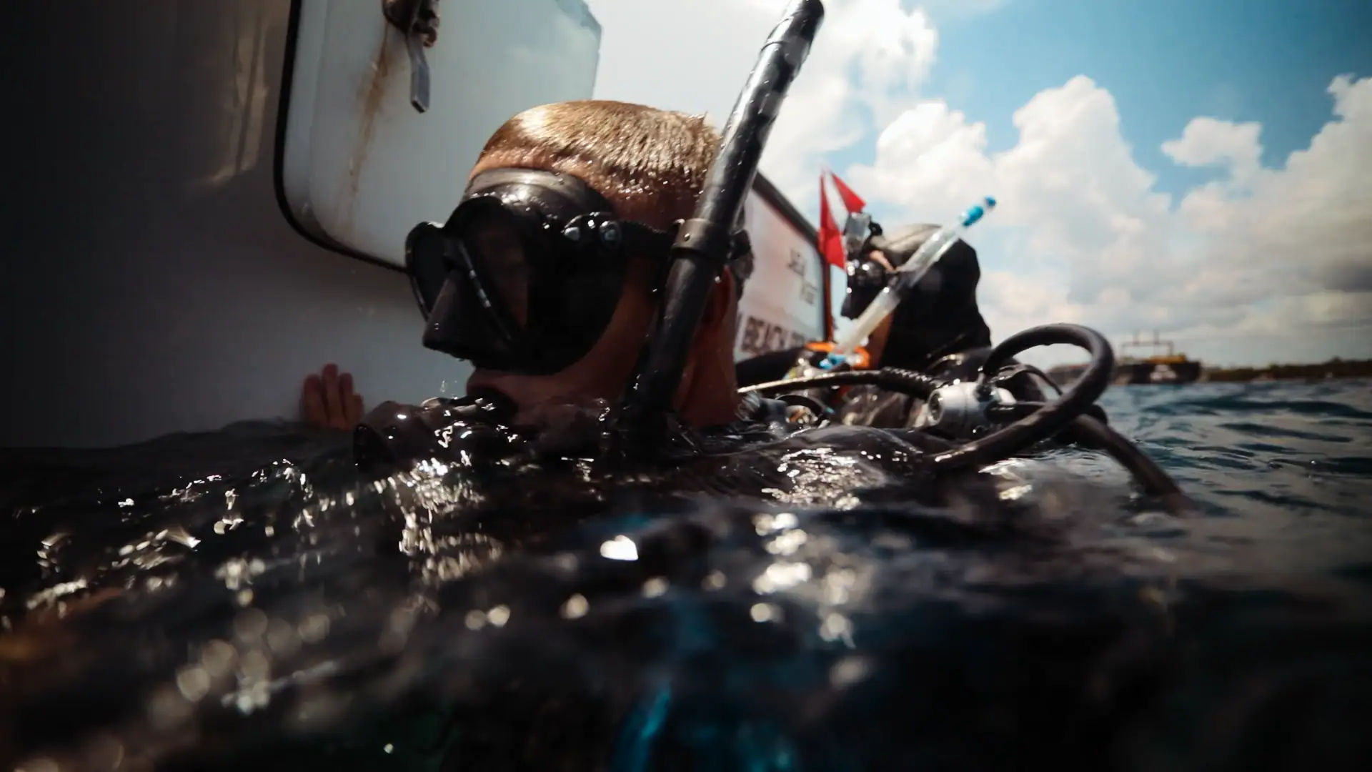 PBPFF diver next to boat