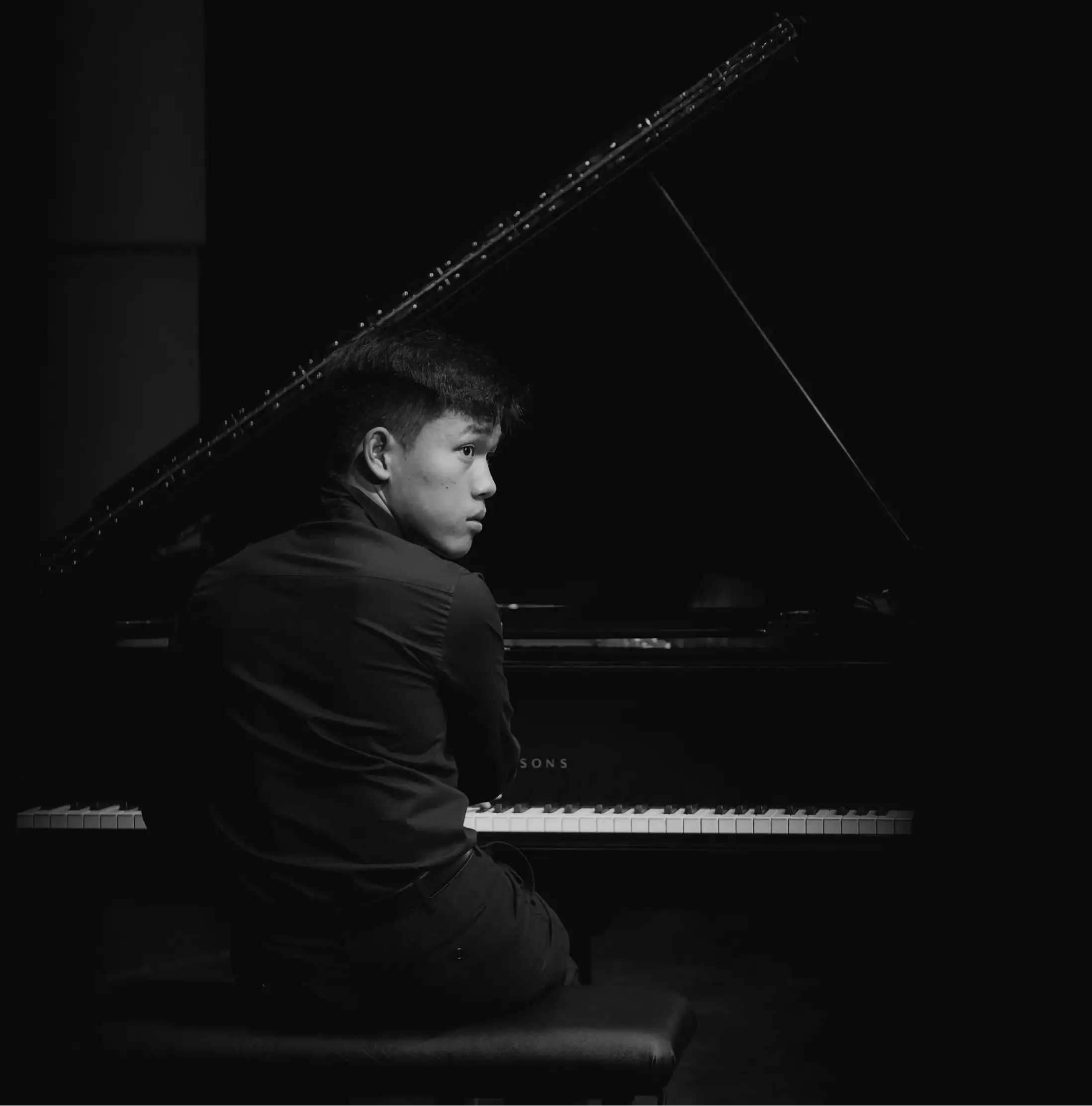 Youth kid playing the piano