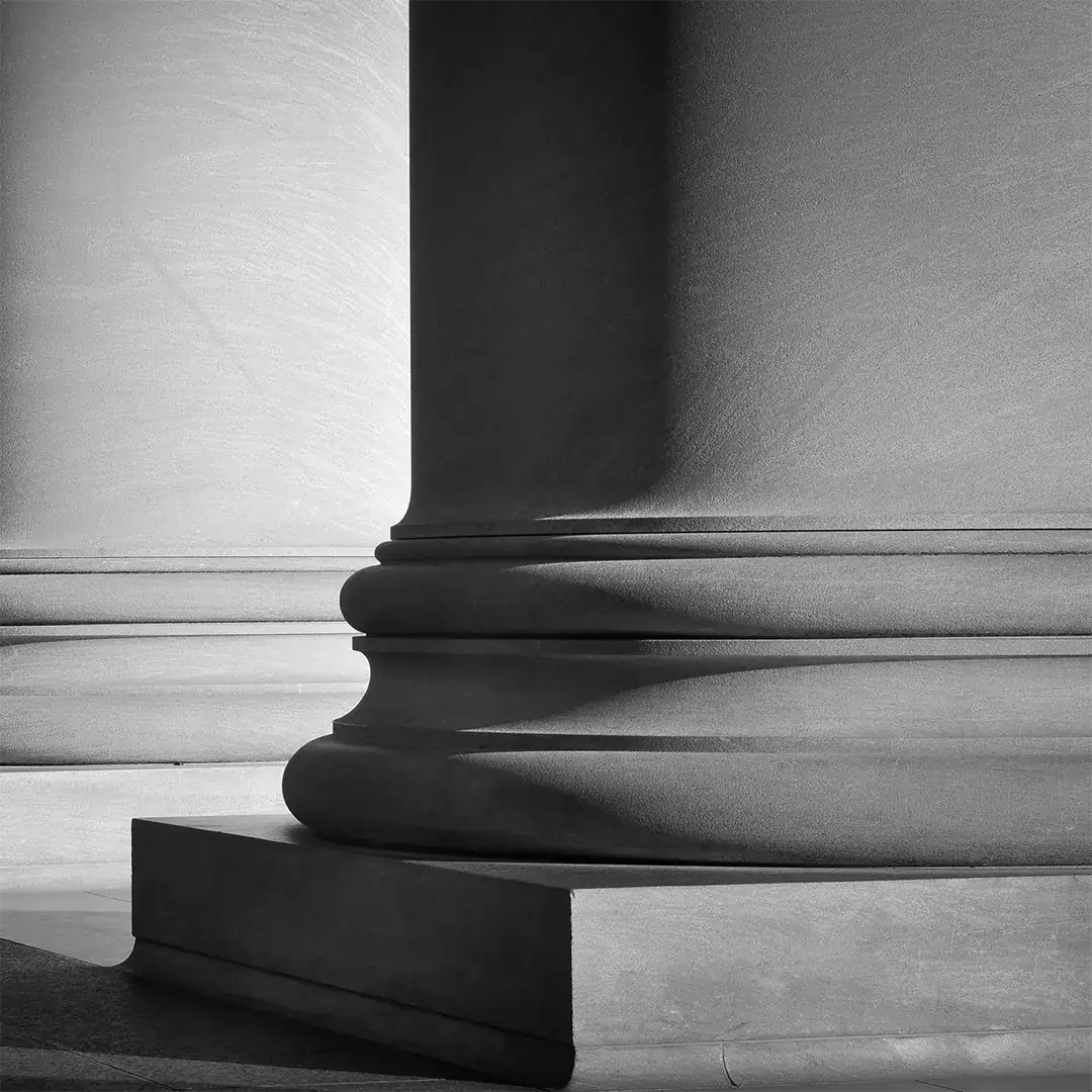 Picture of large stone pillar in black and white