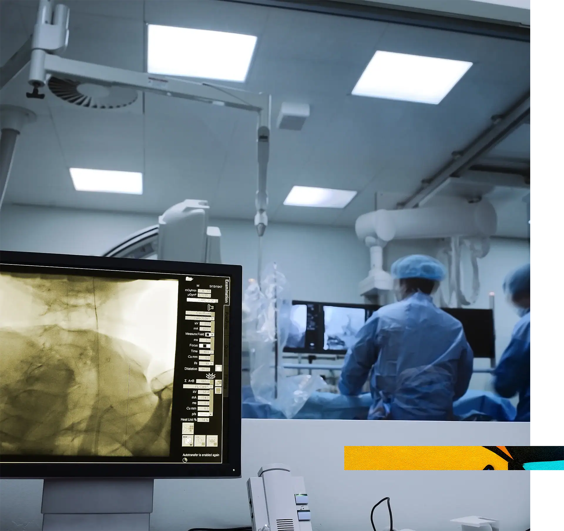 Medical team performing surgery in an operating room with advanced imaging technology.