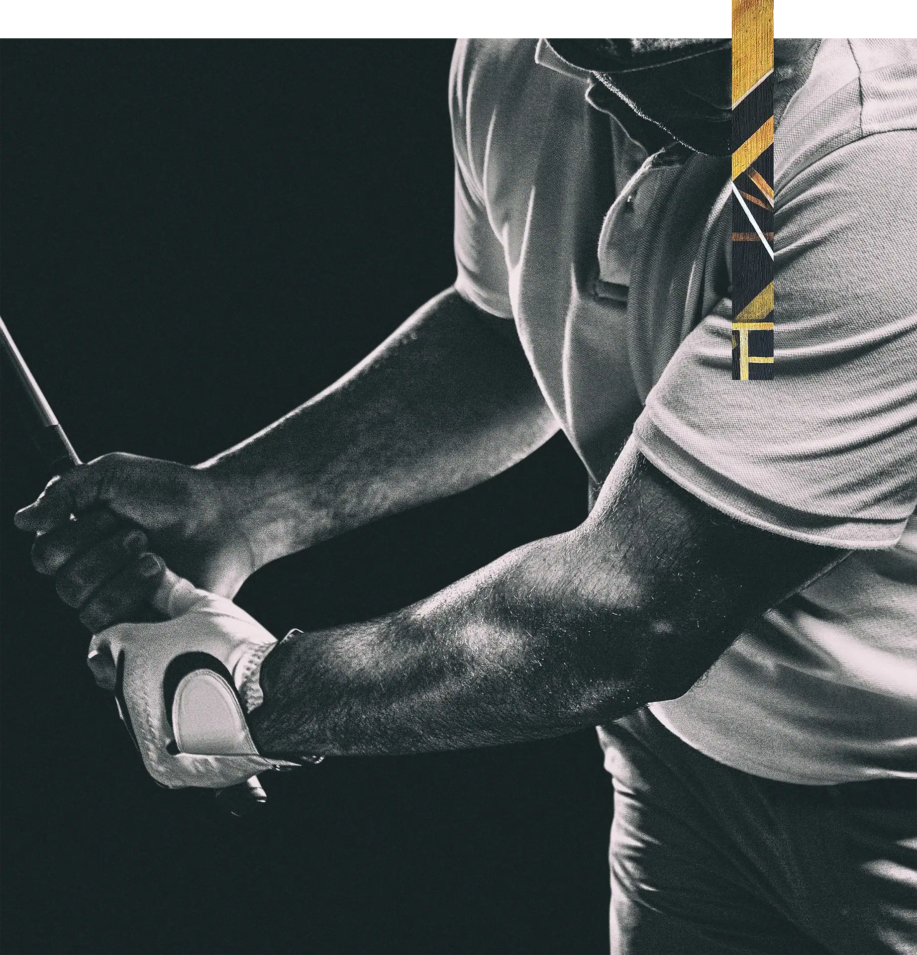 Golf player holding a smartphone during a game.