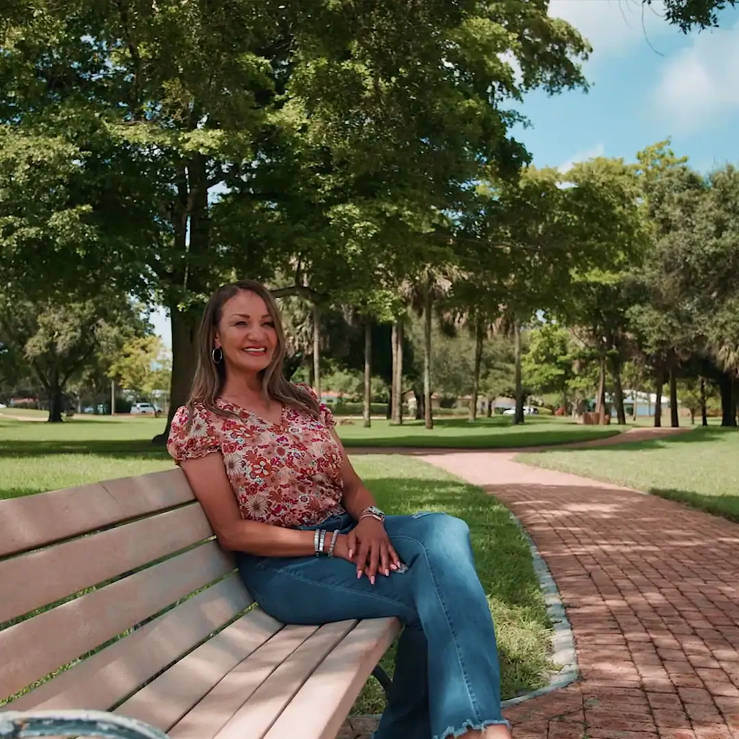 Women sitting on park bench =
