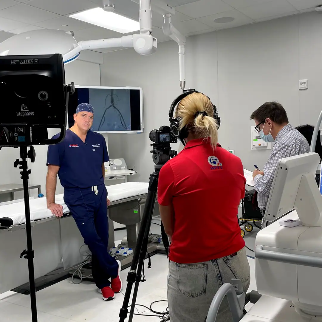 picture of a doctor giving a interview for the news in a operation room