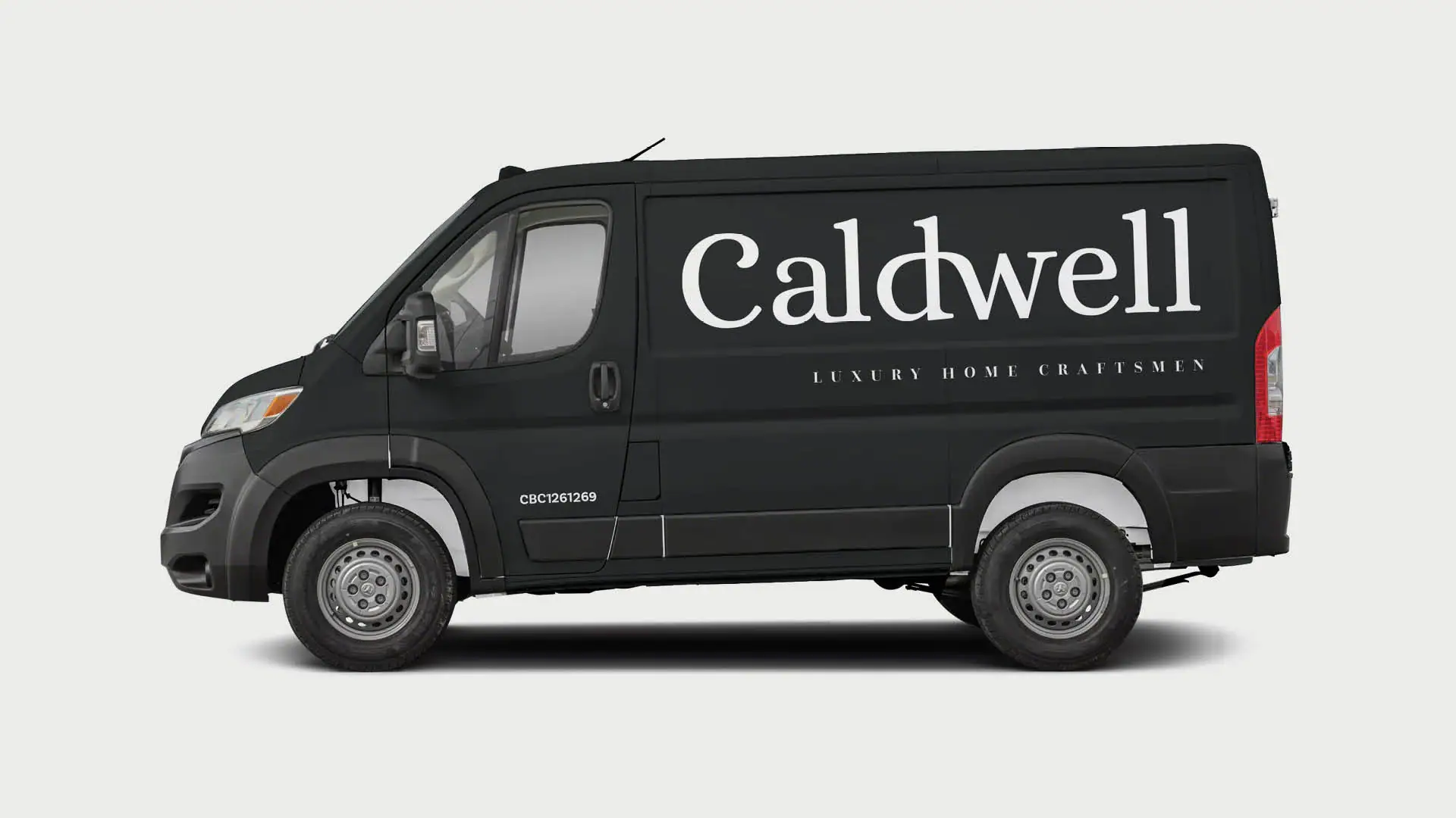 picture of a mockup of the new caldwell logo printed on the side of a black sprinter van